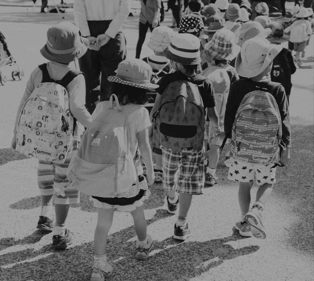 Schoolchildren walking away. 